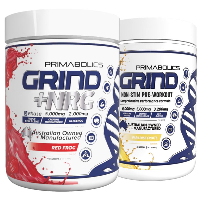 Two white tubs of Primabolics pre-workout supplements available at Me Muscle Nutrition. The left tub is “GRIND + NRG” in Red Frog flavour, and the right tub is “GRIND Non-Stim Pre-Workout” in Paradise Fruits flavour. Both feature bold blue and silver branding with dynamic splash graphics. The tubs highlight Australian ownership and performance-focused design.